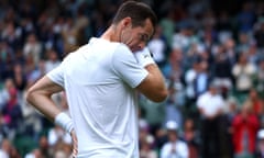 Andy Murray reacts after defeat in the men's doubles first round.