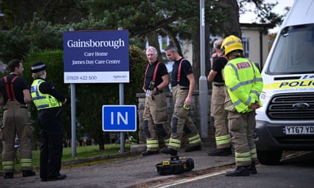 Fire service staff outside the care home.