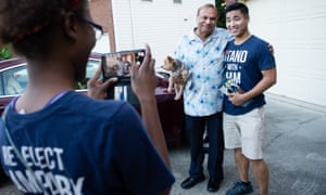 Sam Park, right, poses with resident Sam Gillani.