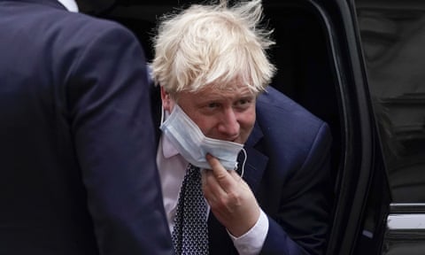 Britain's prime minister Boris Johnson arrives at 10 Downing Street
