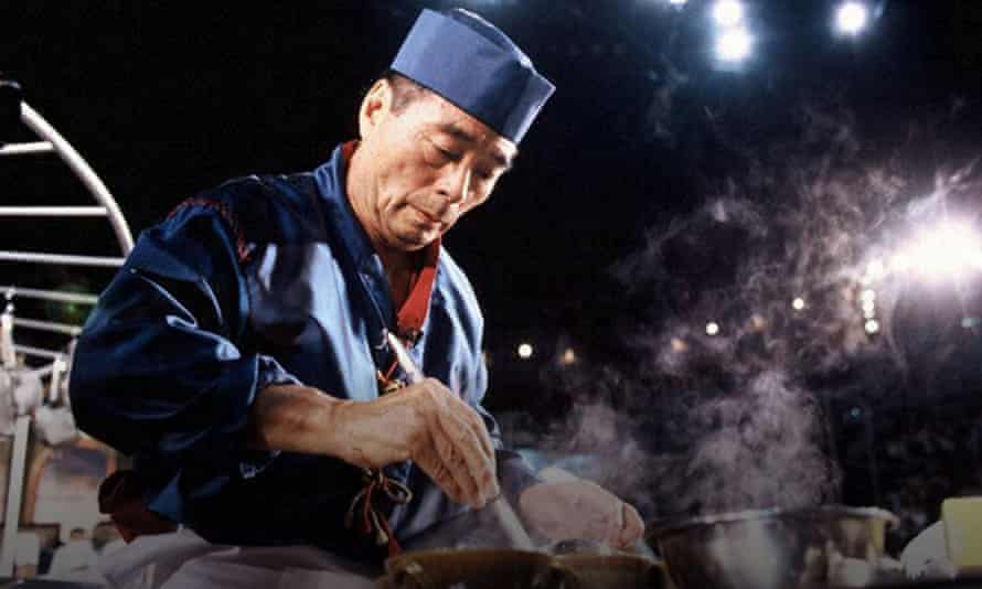 Michiba Rokusaburō, who was Iron Chef Japanese, cooking a dish.