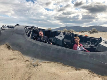 Directors Ryan Fleck and Anna Boden in Captain Marvel’s crashed jet (from the film Captain Marvel)
