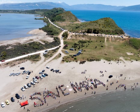 Protesters spell out the words 'Save Narta' in a drone camera shot