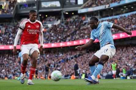 Arsenal’s Cristhian Mosquera in action with Manchester City’s Jeremy Doku