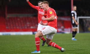 Eóin Doyle of Swindon Town cafter opening the scoring.