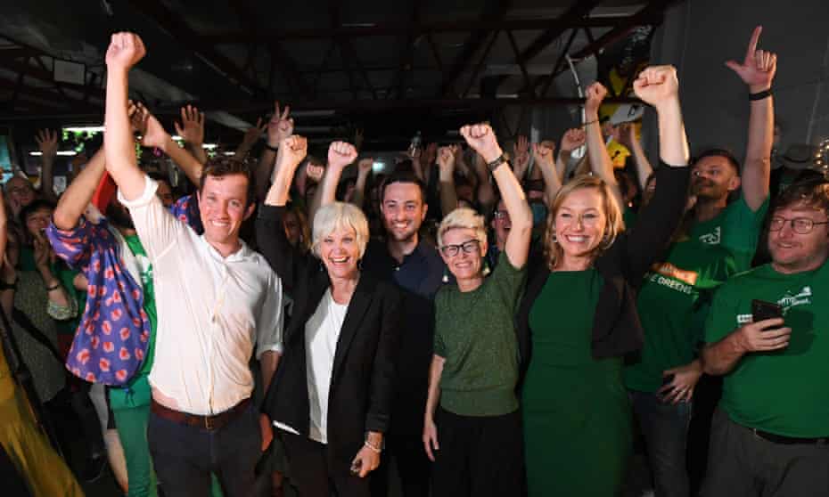 Successful Greens lower house and Senate candidates celebrate with senator Larissa Waters after the party’s success in Saturday’s election.