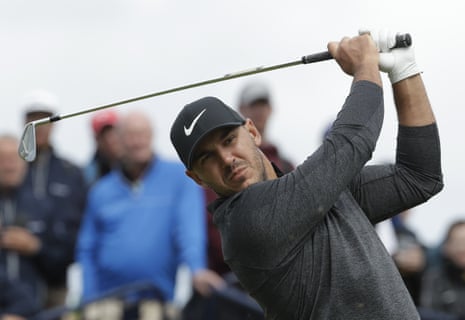Koepka, moves to share the lead.