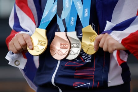 Kimberley Woods of Great Britain with her haul of two golds, one silver and one bronze from the week after winning the final of the womens kayak cross during day six of the ICF Canoe Slalom World Championships 2023 at the Lee Valley White Water Centre.