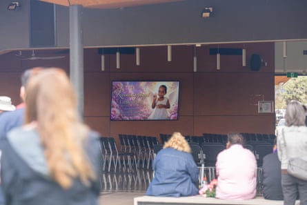 Mourners attend the funeral service for Kumanjayi Little Baby