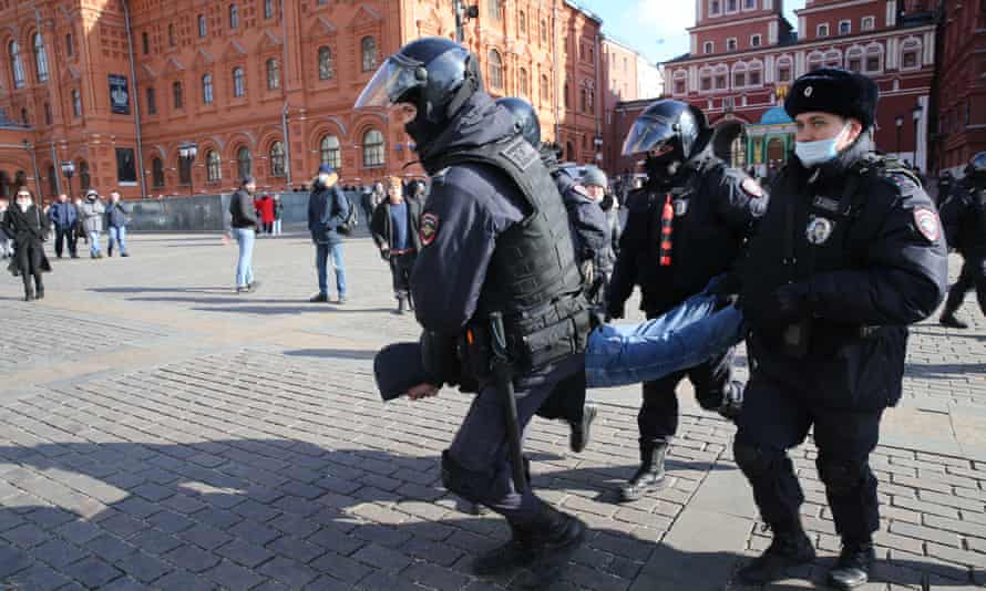 Man is carried away by police