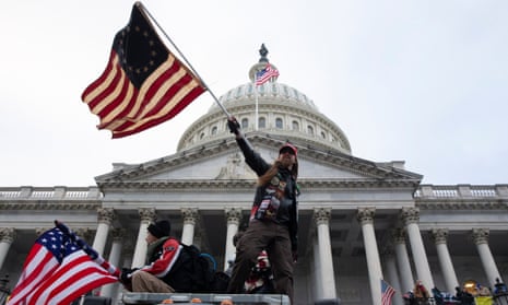Trump supporters storm the grounds of the US Capitol on 6 January. 