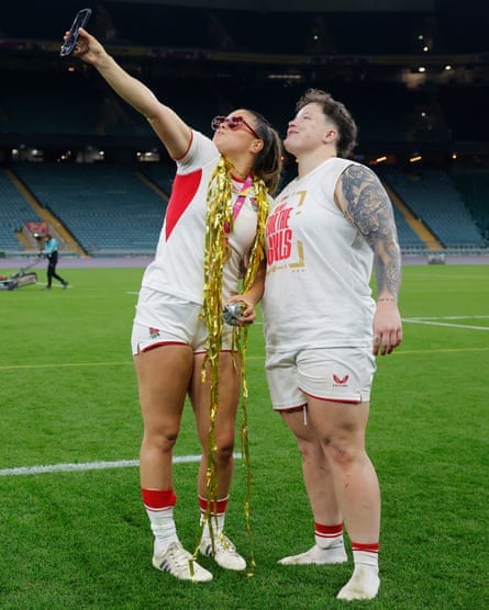 England’s Jess Breach takes a selfie with Hannah Botterman at Twickenham after their team’s victory.