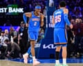 Shai Gilgeous-Alexander celebrates after a play during an Oklahoma City Thunder game.