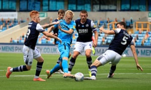 Louie Sibley goes through the Millwall defence before scoring the first of his three goals against them in June.