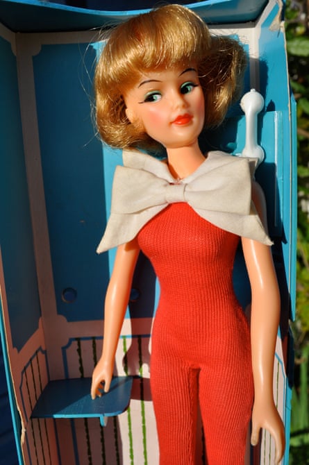 A 1965 Tammy doll in a red jumpsuit