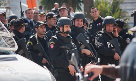  Heavily armed Tunisian security forces secure the area after gunmen opened fire inside the leading museum in Bardo in Tunis, Tunisia. 