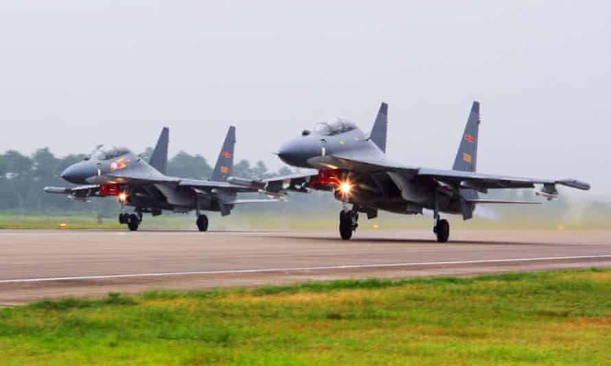 China sent a record number of military aircraft into Taiwan’s air defence zone on Monday