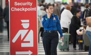 Security staff member at Chicago O’Hare airport.
