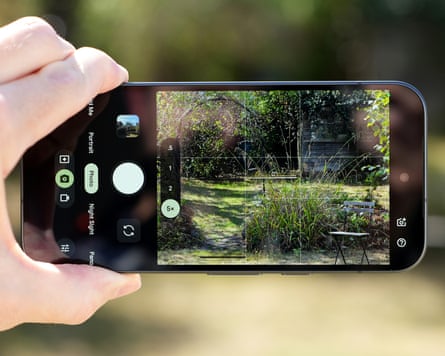 The camera app on a Google Pixel 11 shooting a garden scene.