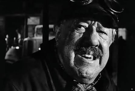 Man with moustache in hat with goggles