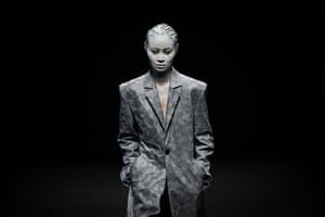 Beijing, China. A model wears a creation from the Mi&Go collection by Long Jing during China fashion week