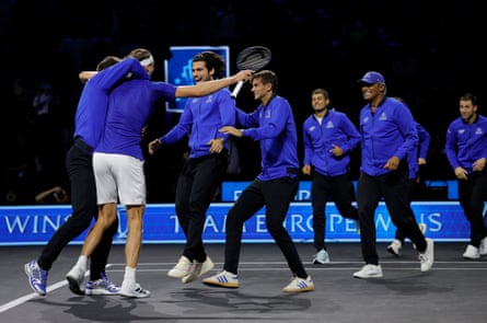 The players of Team Europe run onto court to celebrate winning the Laver Cup.