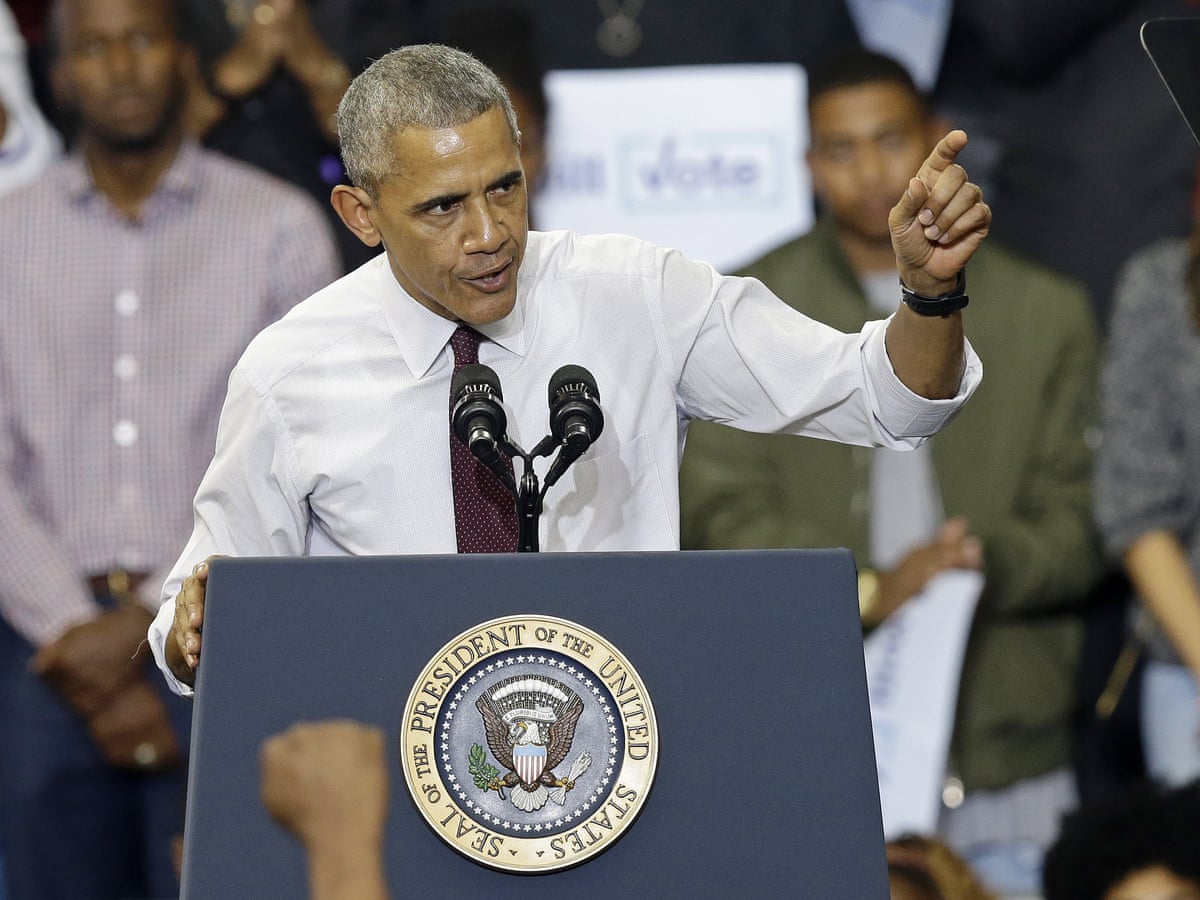 Obama chides rally audience for booing Trump supporter – video | Barack Obama | The Guardian