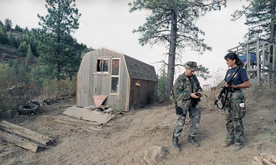 Alcohol, Tobacco and Firearms agents stand next to the outbuilding located near the Randy Weaver home near Naples, Idaho.