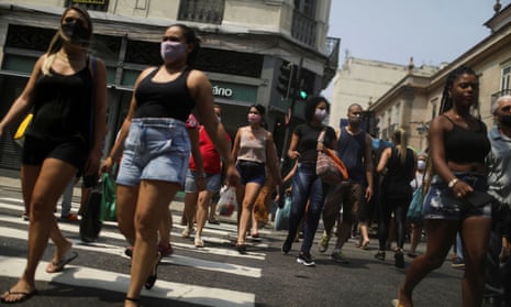 People walk around the Saara street market, amid the outbreak of the coronavirus disease, in Rio de Janeiro, Brazil.