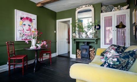 ‘You can’t be miserable with a polka dot’: the cottage’s front room with the bamboo chairs Catherine sprayed red.