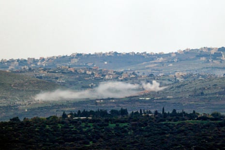 This picture taken from an Israeli position near southern Lebanon shows smoke billowing above the Lebanese village of Blida during Israeli bombardment on 17 January.
