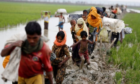 Rohingya Muslims fleeing military operations in Myanmar’s Rakhine state make their way to Bangladesh.