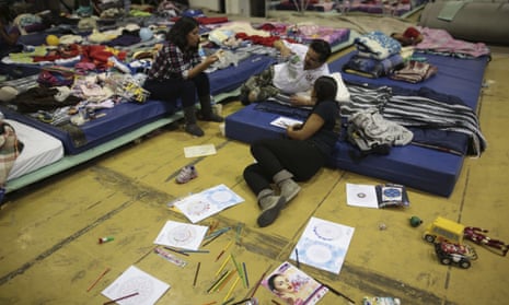People who lost their homes in the 7.1 magnitude earthquake rest inside a gymnasium turned in an evacuation center in Mexico City
