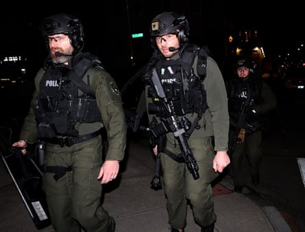 Police arrive at the scene at night