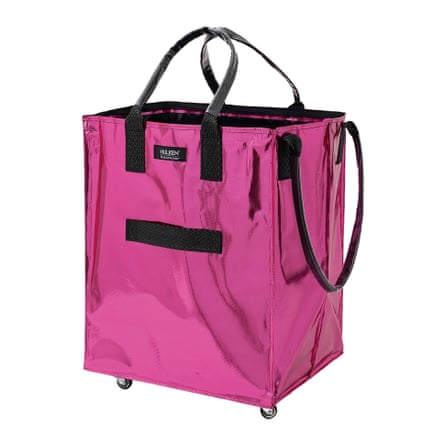 Black-trimmed pink rectangular bag on wheels