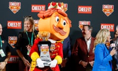 Prince Cheddward, the Cheez-It Bowl mascot, carries the game trophy after the Cheez-It Bowl between the Florida State Seminoles and Oklahoma Sooners in 2022