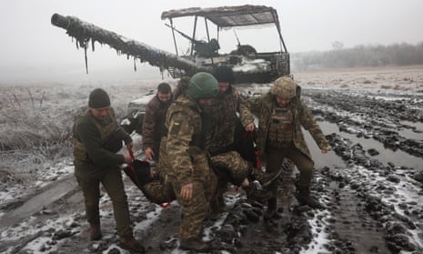 Ukrainian tank crews practice the evacuation of a comrade during a drill not far from the frontline in Donetsk region.