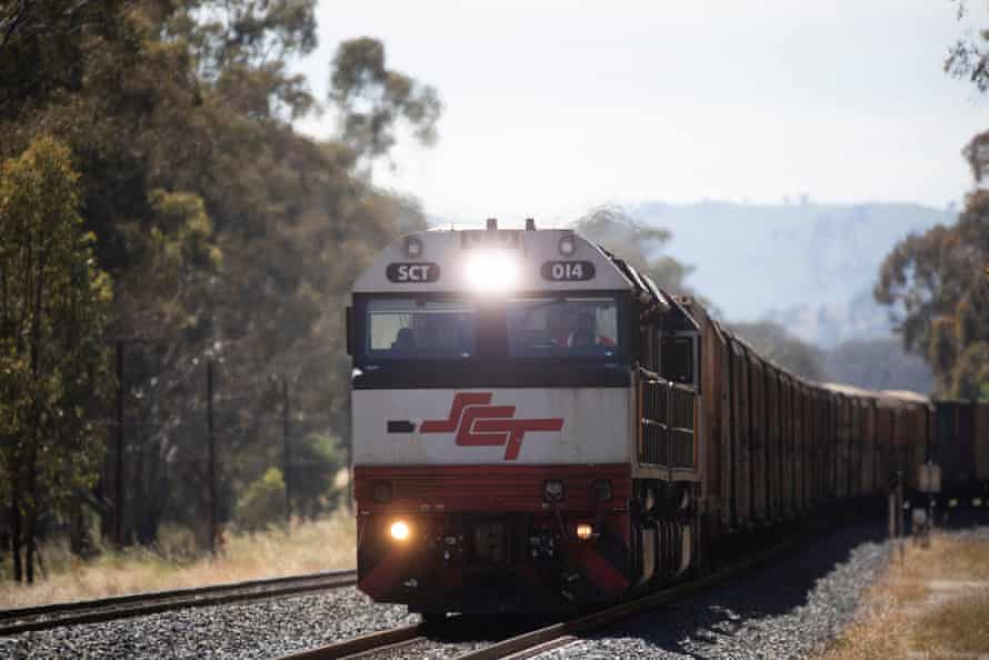 A freight train on the rails.