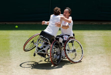 Alfie Hewitt (left) celebrates victory by jumping into the arms of his men’s wheelchair doubles partner, Gordon Reid