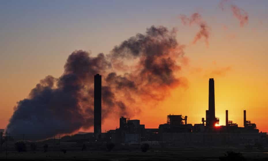 A coal-fired plant at sunset
