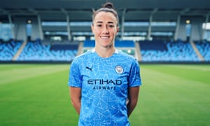 Lucy Bronze poses at Manchester City after signing a two-year deal.