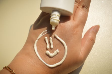 A smiley face made of sunscreen