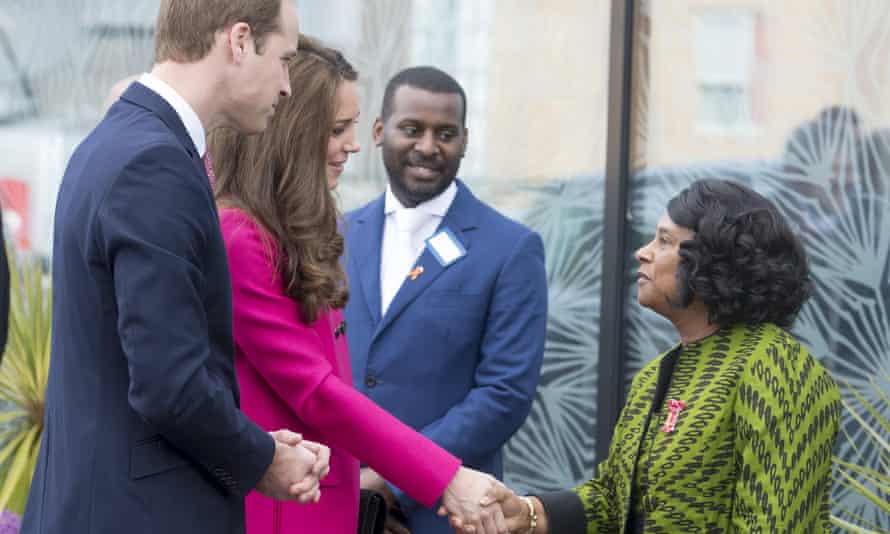Stuart and Doreen Lawrence meeting the Duke and Duchess of Cambridge, the two women shaking hands