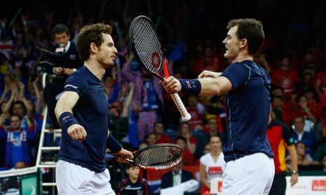 Jamie and Andy Murray celebrate after defeating Belgium.