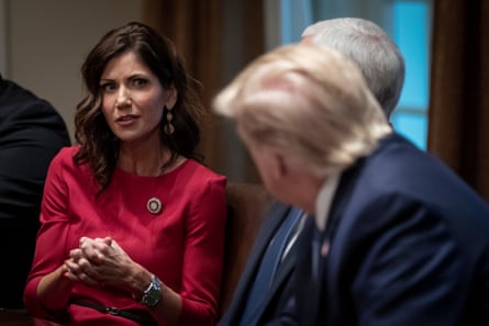 Kristi Noem with Donald Trump at the White House in December.