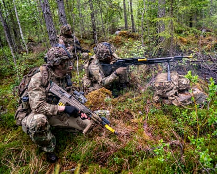 British Army 3 Rifles provide covering machine gun fire
