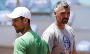 Goran Ivanisevic (right), the coach of Novak Djokovic (left), has tested positive for Covid-19