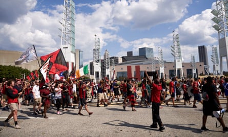 Atlanta United fans marching to the stadium together.