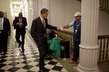 Obama fist-bumps custodian Lawrence Lipscomb in the White House in 2009.