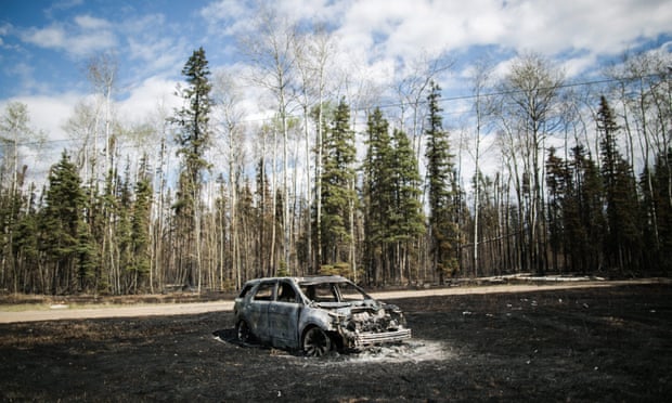 A burnt vehicle in Fort McMurray, 10 May 2016